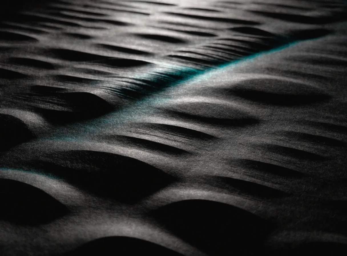 Close view of a night press plate surface, ink texture filling the frame
